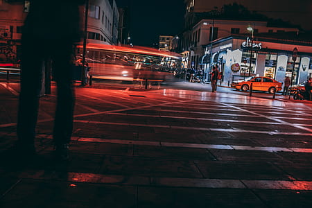 timelapse photography of vehicles near buildings thumbnail