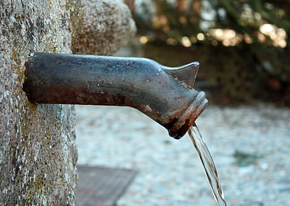 gray metal pipe with running water thumbnail