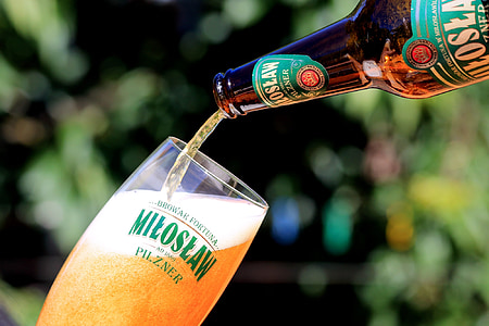 close-up photography of Miloslan bottle pouring clear drinking glass thumbnail
