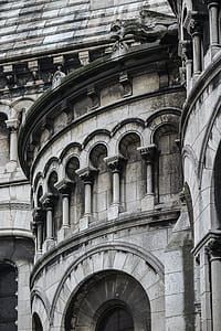 Beautiful stonework, darkened over time, at the Sacre Coeur in Paris, France. thumbnail