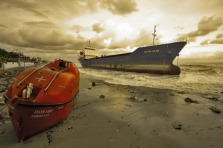 docked ship on shore thumbnail