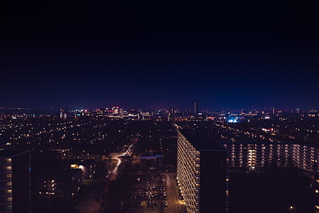aerial photograph of high rise buildings during night time thumbnail