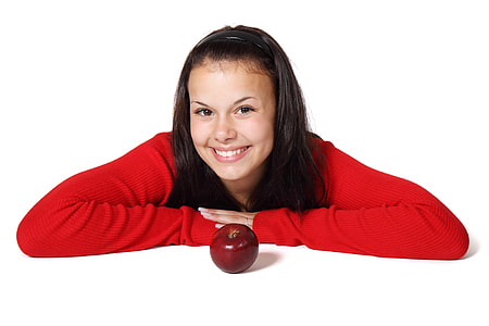 woman wearing red sweatshirt leaning on table thumbnail