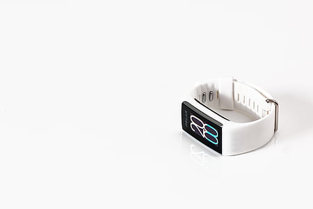 black digital watch with white strap thumbnail