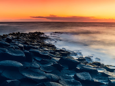 body of water during sunset thumbnail
