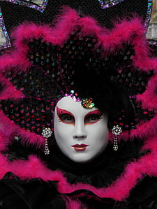 person wearing masquerade mask thumbnail