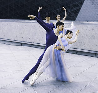 two man and two woman dancing on grey floor thumbnail