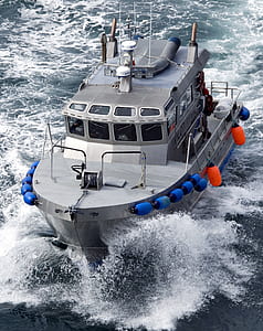high angle photo of gray boat thumbnail
