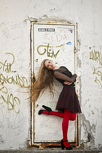 woman wearing black dress during daytime thumbnail