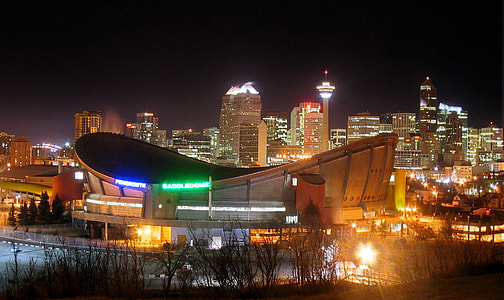 Lights with saddledome and skyline at night in Calgary, Alberta, Canada thumbnail