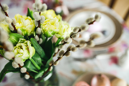 Easter table with cute pink decorations, flowers, catkins and eggs thumbnail