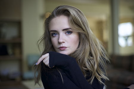 woman wearing long-sleeved top thumbnail