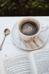Cup of Coffee and an Open Book thumbnail