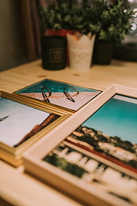 three photo frames on beige surface thumbnail