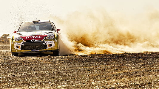 yellow Citroen C-Elysee on dirt road thumbnail