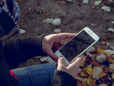 person holding iPhone thumbnail