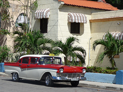 red and white classic car thumbnail