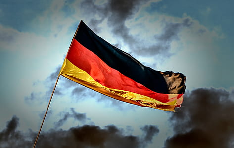 Germany flag under cloudy sky during daytime thumbnail