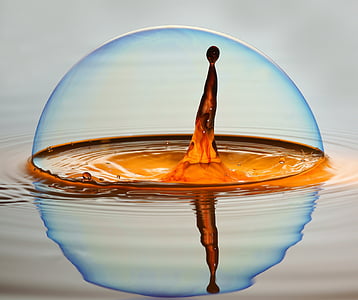 drop of flavored liquid surrounded with bubble thumbnail