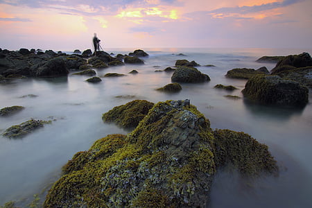 time-lapse photography of rocks and body of water thumbnail