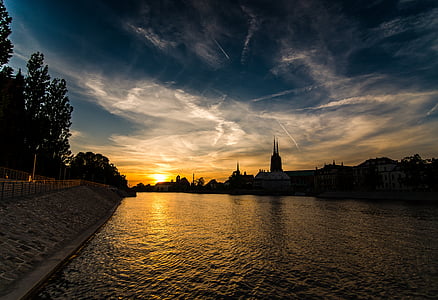 landscape photography of river during sunset thumbnail