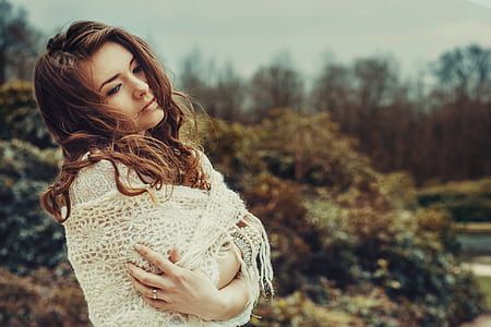 shallow focus photography of a woman in white shawl thumbnail