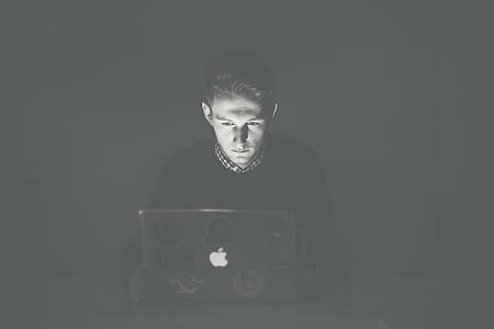 man using black MacBook thumbnail