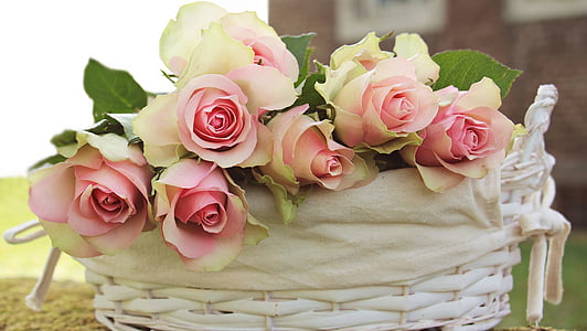 pink and white roses arrange in wicker white basket thumbnail