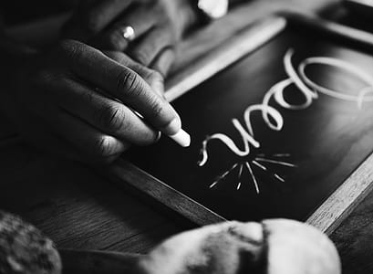 Person Righting On Chalkboard thumbnail