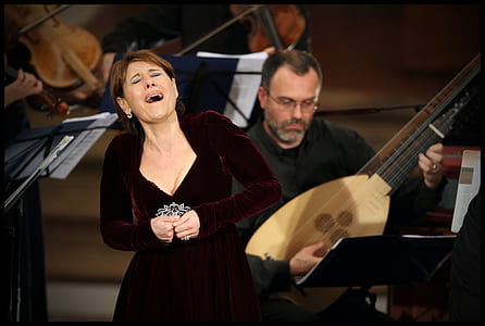 woman singing on stage thumbnail
