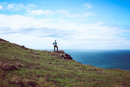 person standing on grass thumbnail