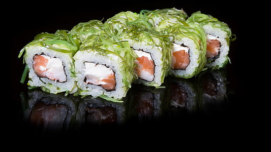 sushi against black background thumbnail