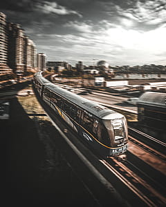 gray and black train moving thumbnail