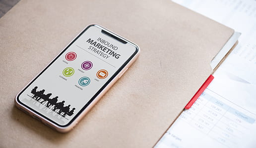 white smartphone on brown folder thumbnail