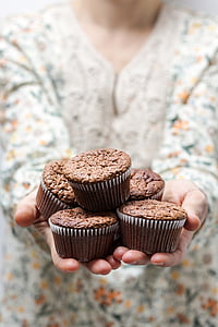 five muffins on person hands thumbnail