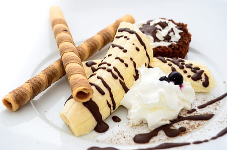 chocolate syrup on top of banana with wafer thumbnail