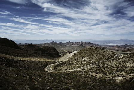 aerial view of concrete road under blue sky thumbnail