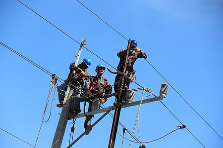 three men on gray pole thumbnail