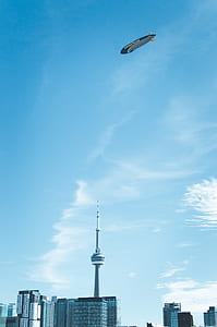 CN Tower taken under white clouds at daytime thumbnail