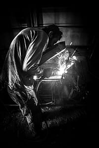 Greyscale Photo of Person Having Welding thumbnail