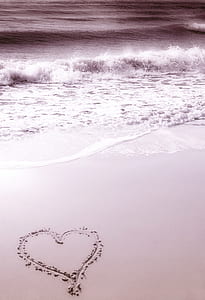 heart sand decor near ocean thumbnail