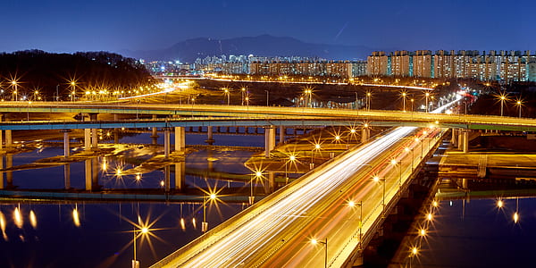 city bridges during night time time lapse shot thumbnail