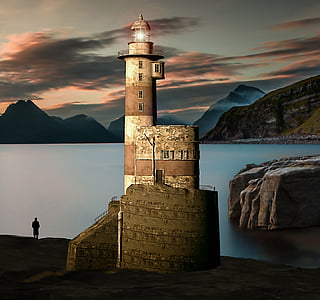 photo of lighthouse near sea thumbnail