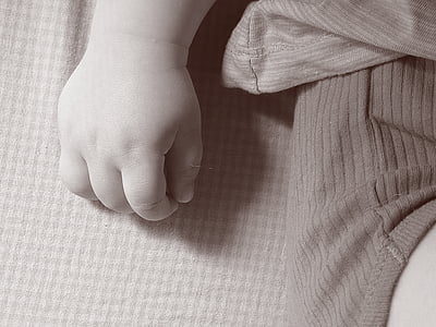 toddler wearing brown one\sies thumbnail