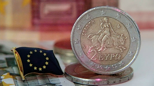 round silver-and-gold-colored coin thumbnail