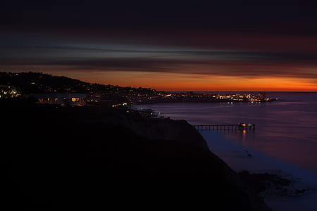 aerial photography of cityscape at night time thumbnail