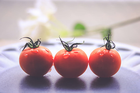 three orange tomatoes thumbnail