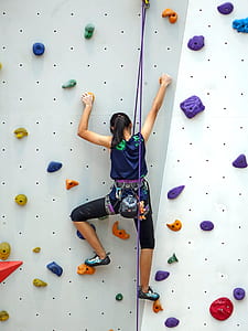 woman doing indoor wall climbing thumbnail