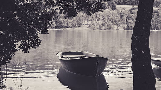 grayscale photography of Jon boat thumbnail
