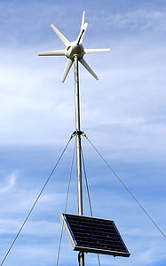 gray tower with solar panel under blue sky during daytime thumbnail